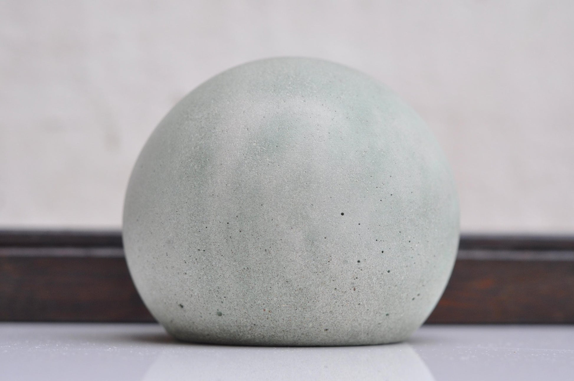 Smooth cement sphere for minimalist decor