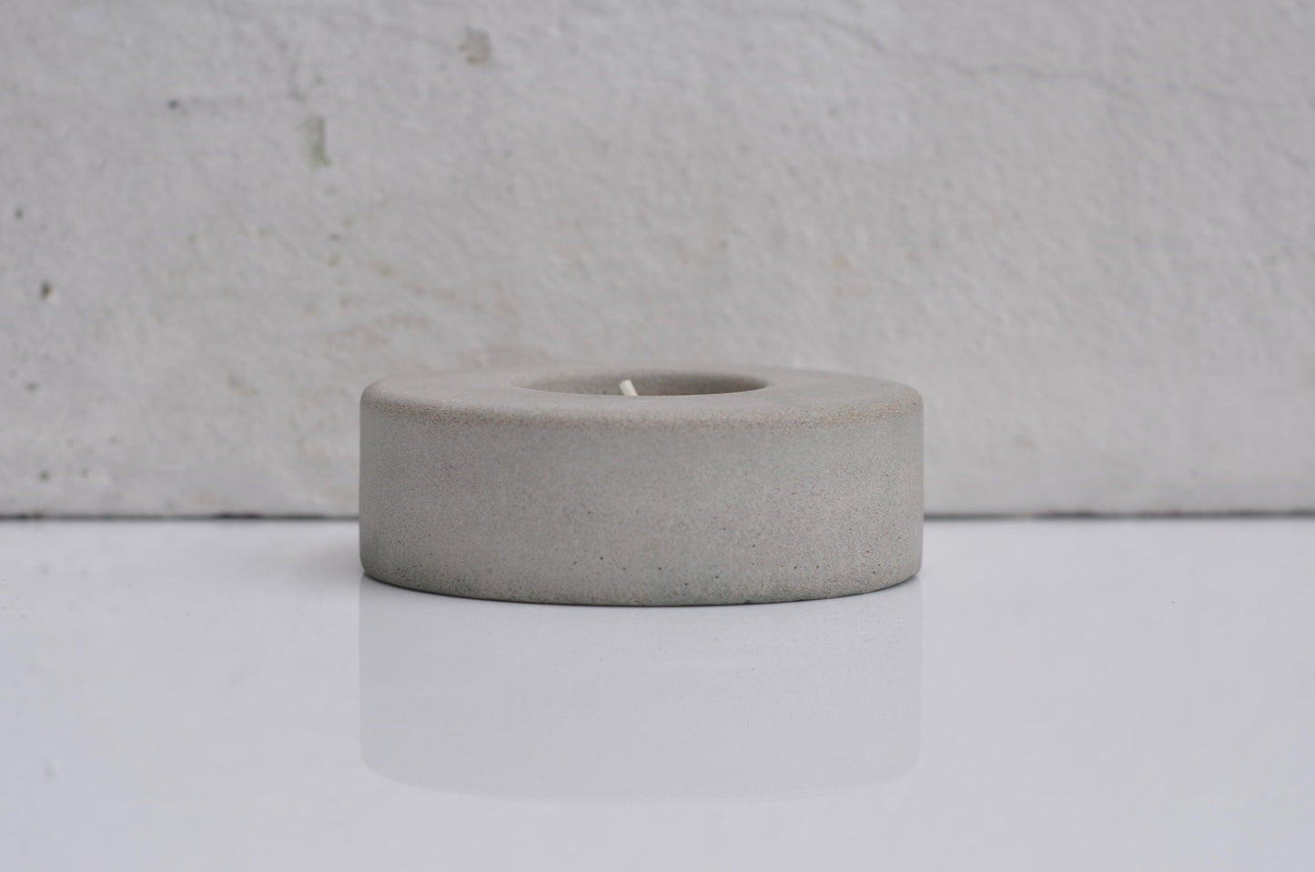 Modern concrete candle holder for cosy lighting