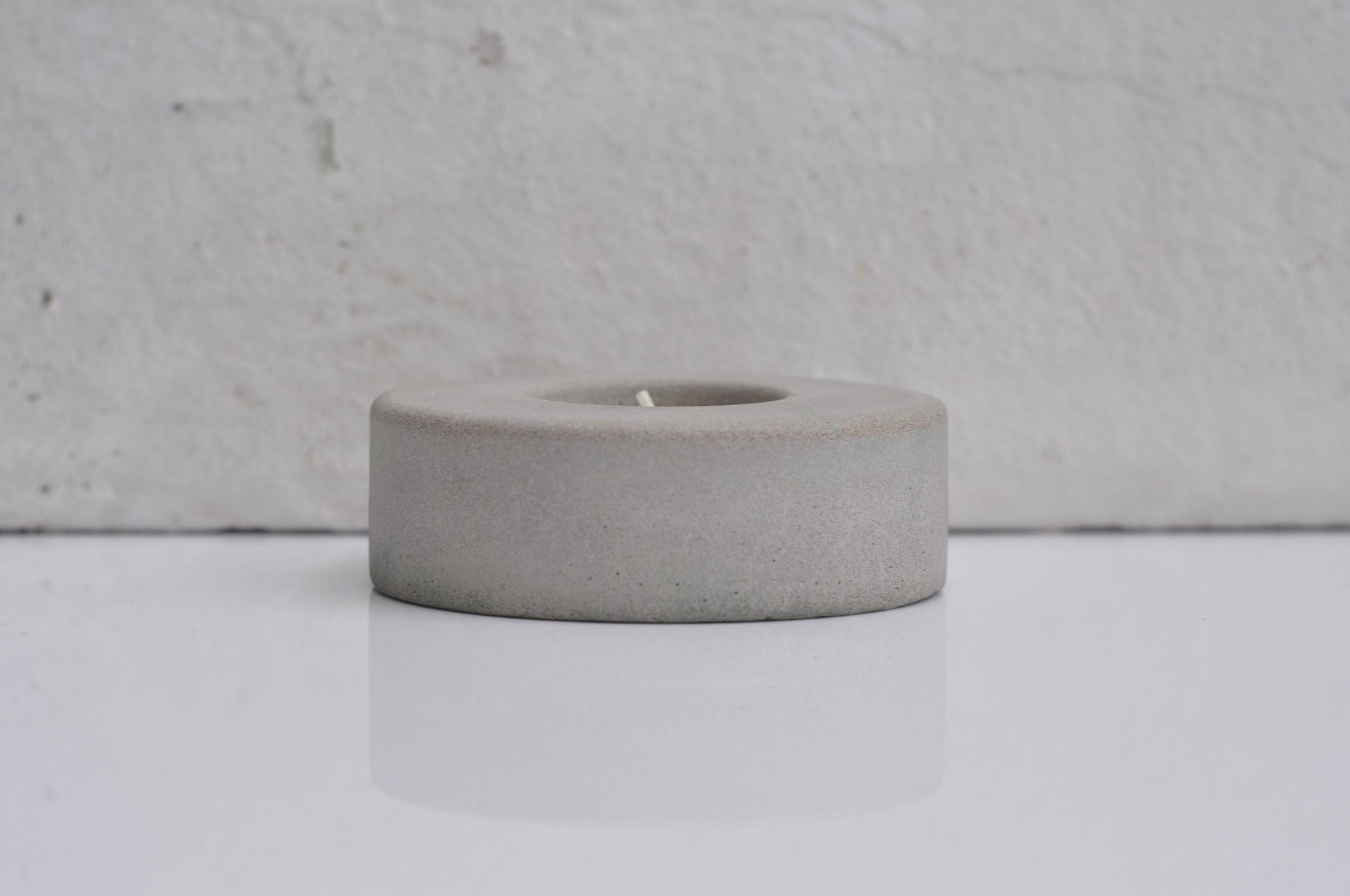 Modern concrete candle holder for cosy lighting