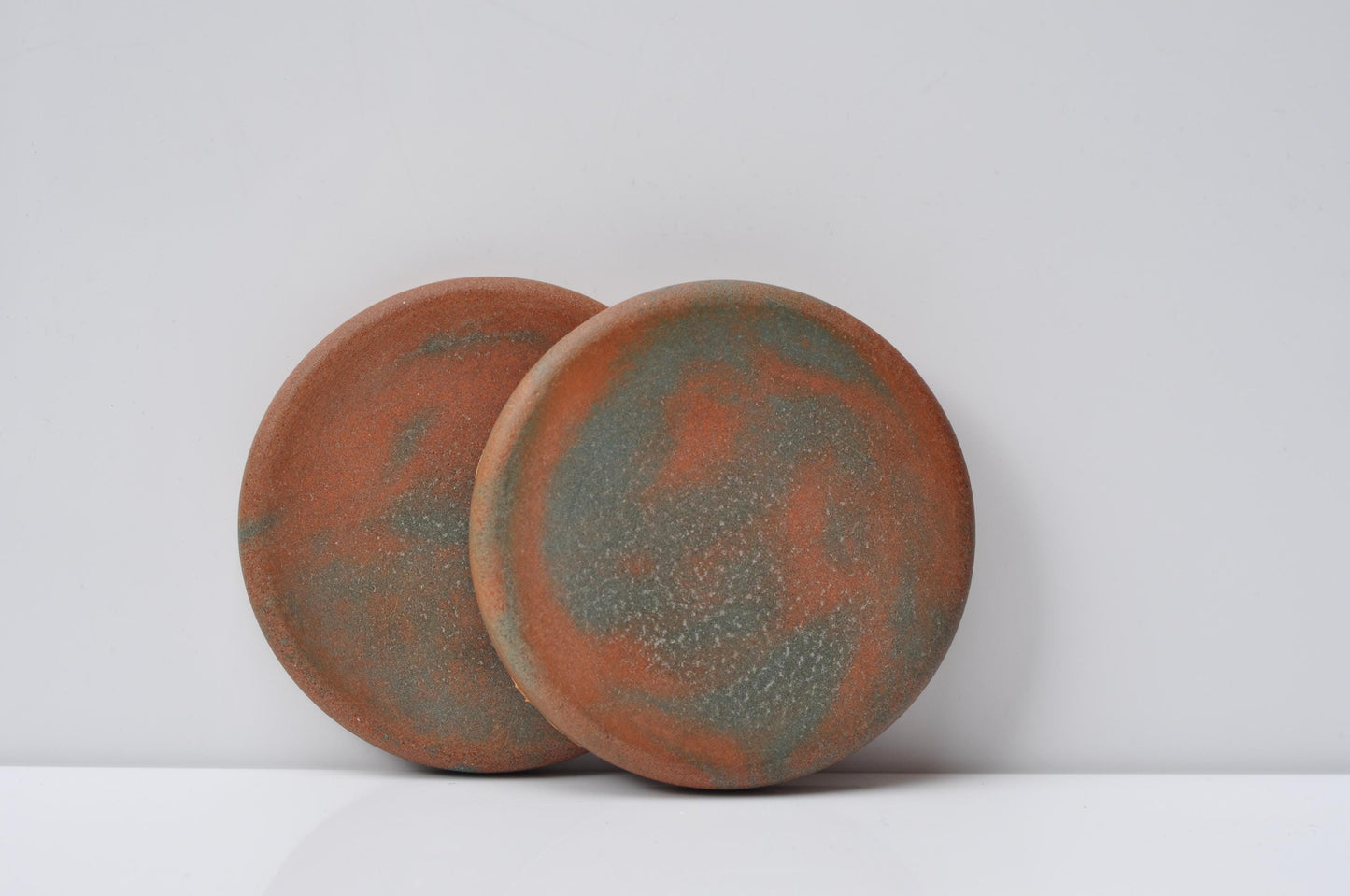 Handmade concrete coasters with geometric design