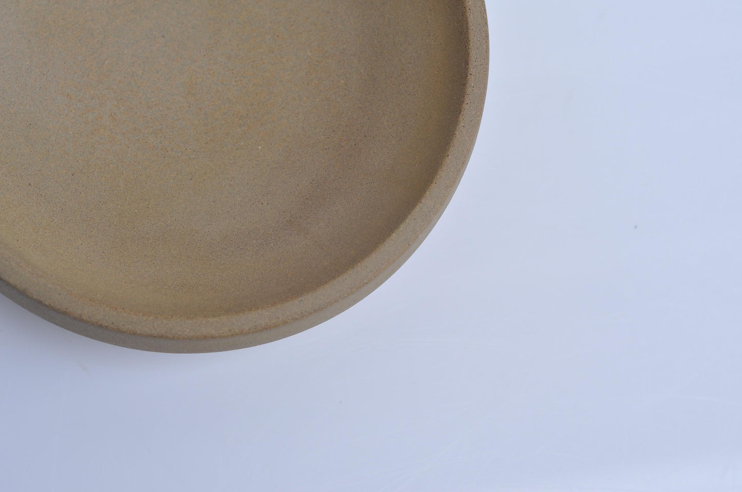 Concrete key and jewellery bowl on entryway table