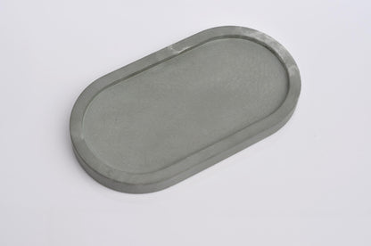 Studio shot of handmade green concrete tray