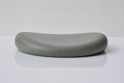 Studio shot of handmade grey and green concrete tray