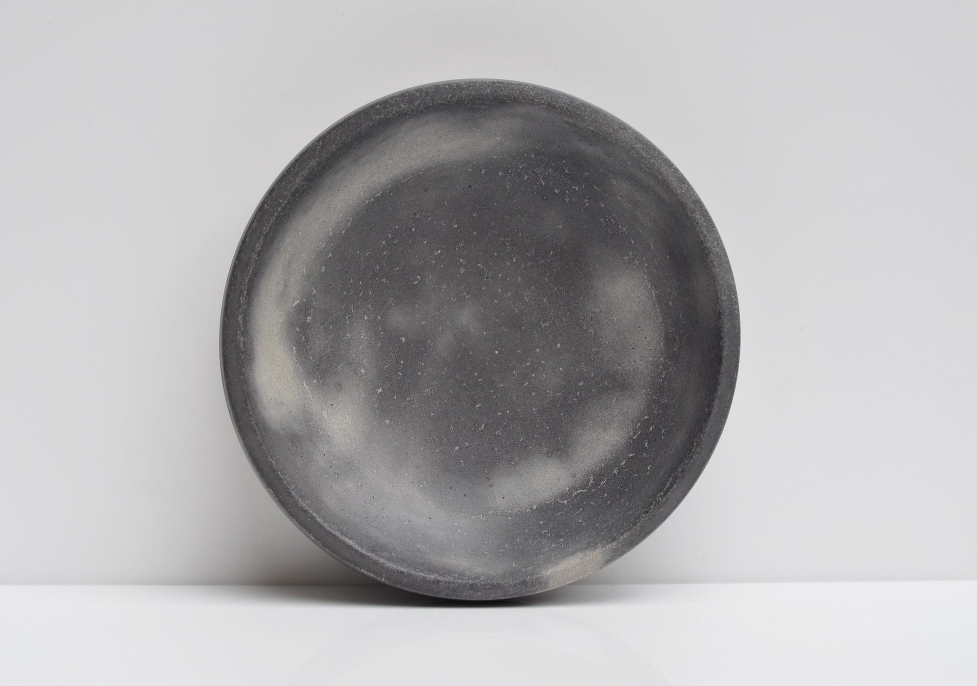 Close-up texture of grey cement bowl