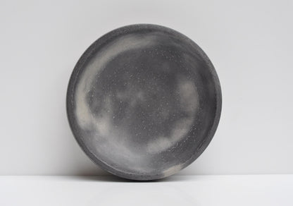 Close-up texture of grey cement bowl