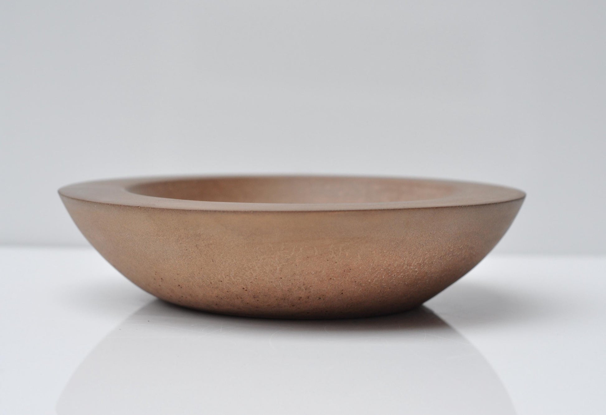 Shallow handmade bowl with matte finish