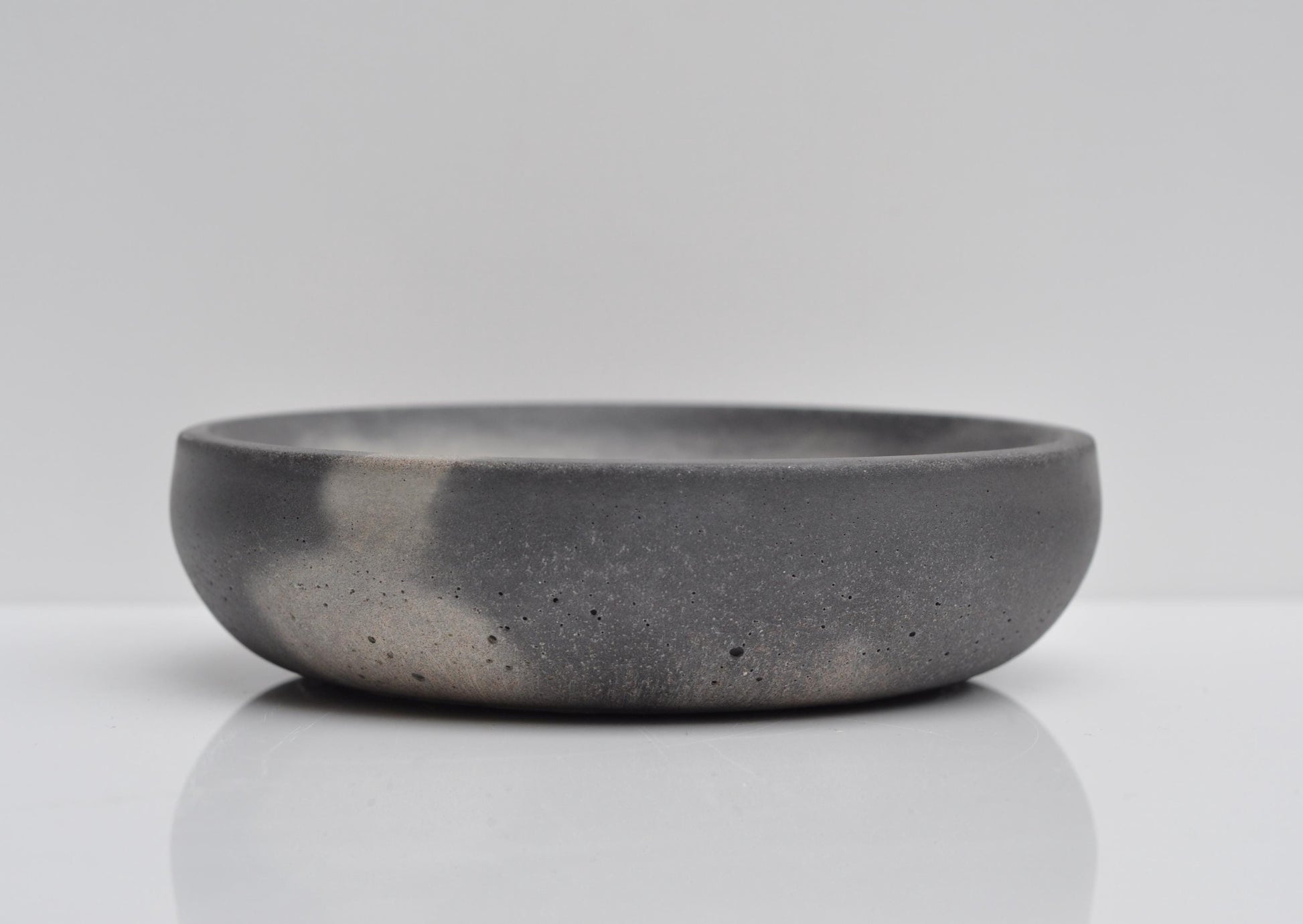 Small concrete bowl in modern home setting