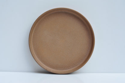 Concrete tray holding everyday essentials