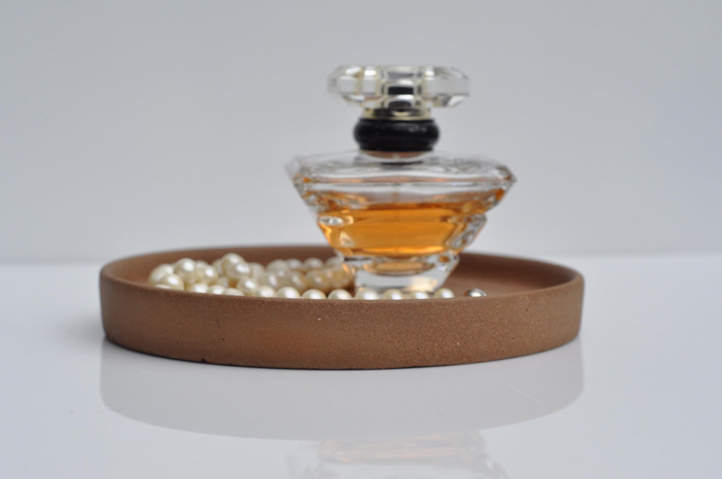 Handmade cement tray on entryway table