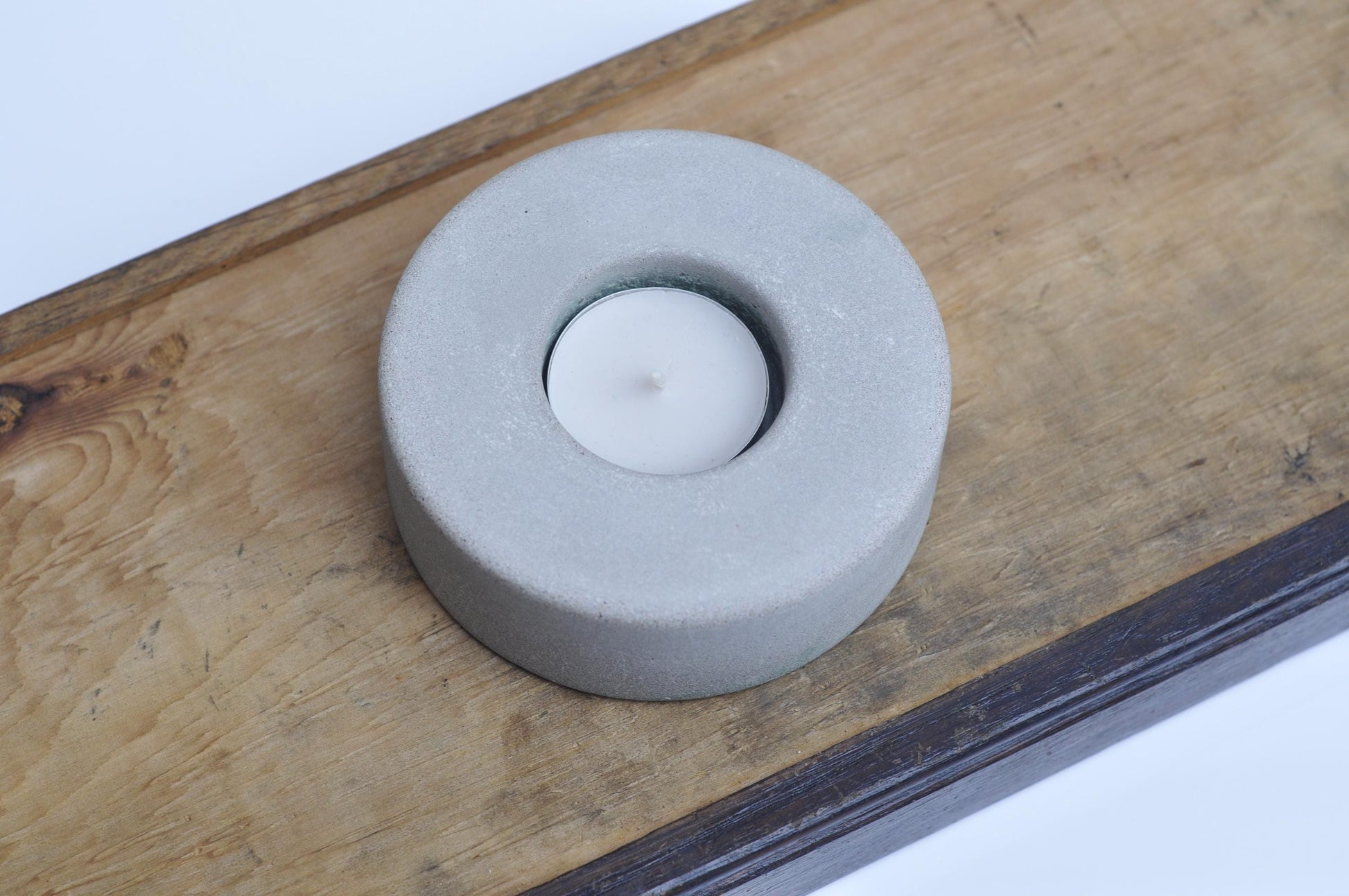 Small brutalist tealight holder made of concrete