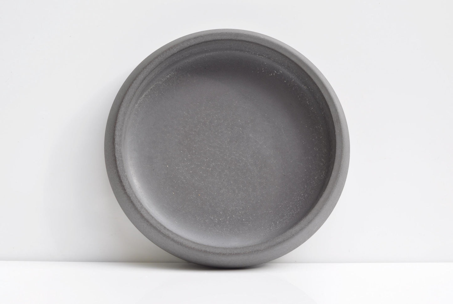 Close-up of textured anthracite concrete surface