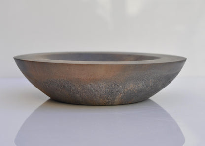 Shallow concrete bowl as modern minimalist accessory tray